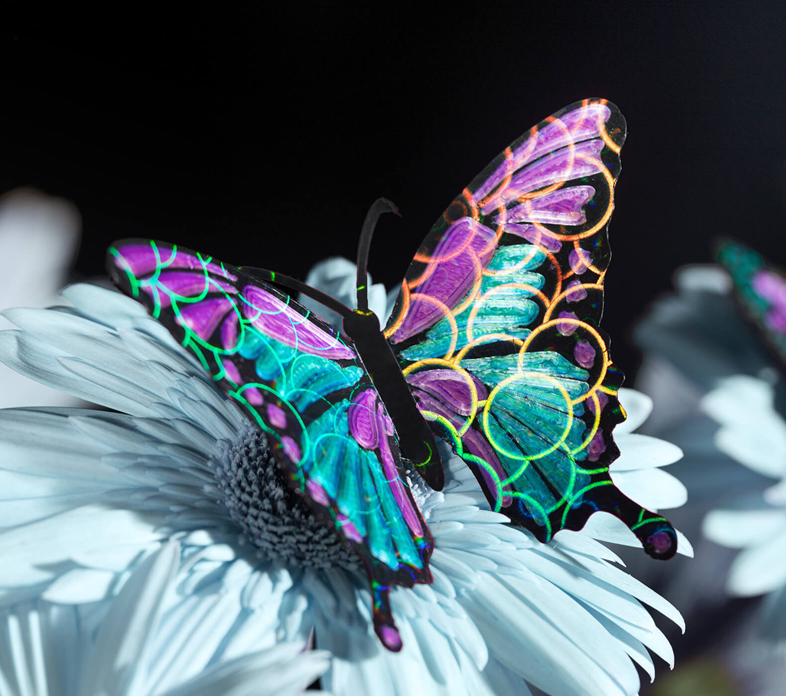 Vibrant 3D printed butterfly model.