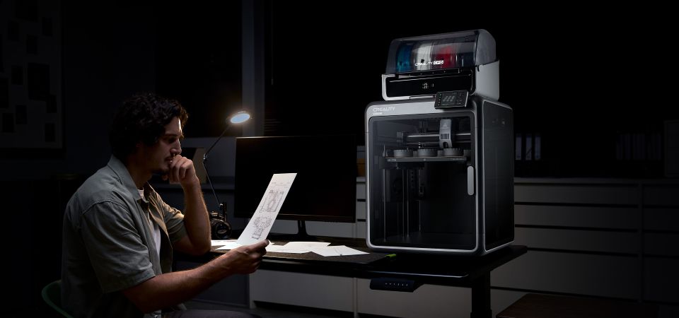 The Creality K2 Pro operating quietly in a professional workspace.